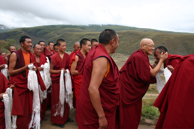 Geshe Tashi Tsering greets monks at Khangmar Monastery