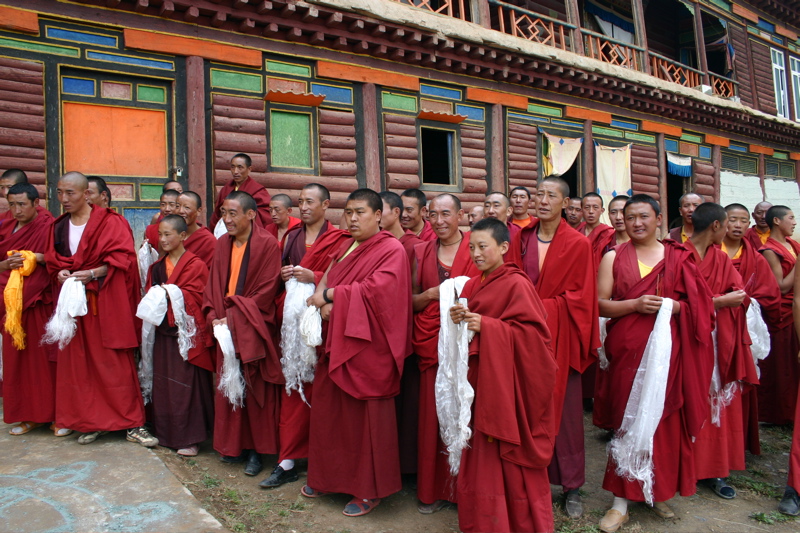 Geshe Tashi Tsering greets monks at Khangmar Monastery